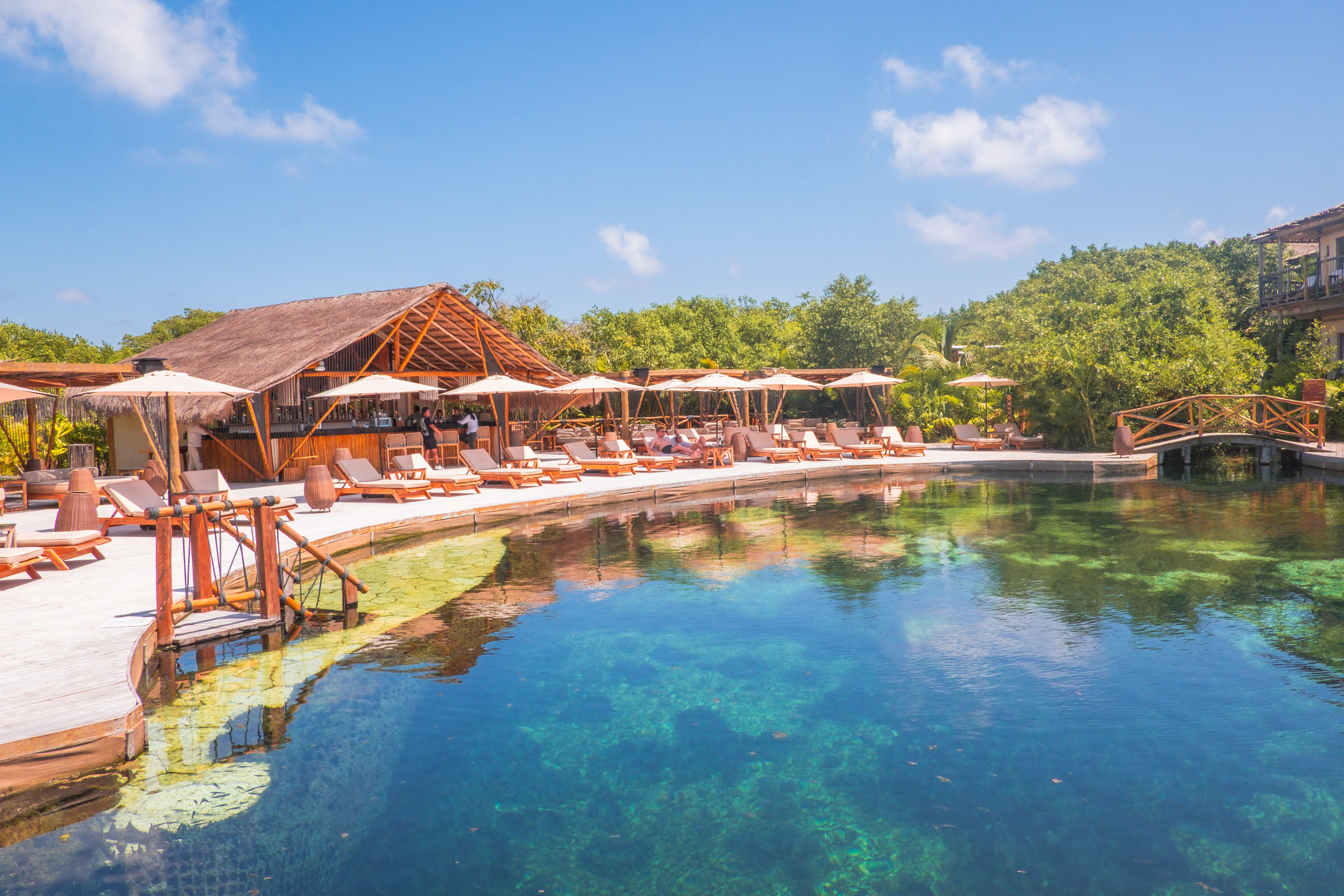 Sunny cenote club in Tulum Mexico